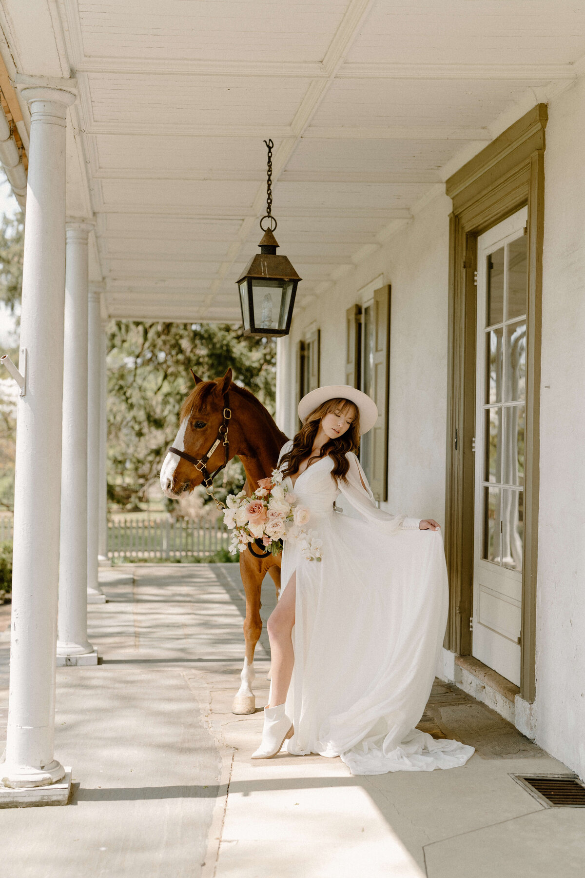 bridal portraits with horse at white chimneys estate, Lancaster, PA