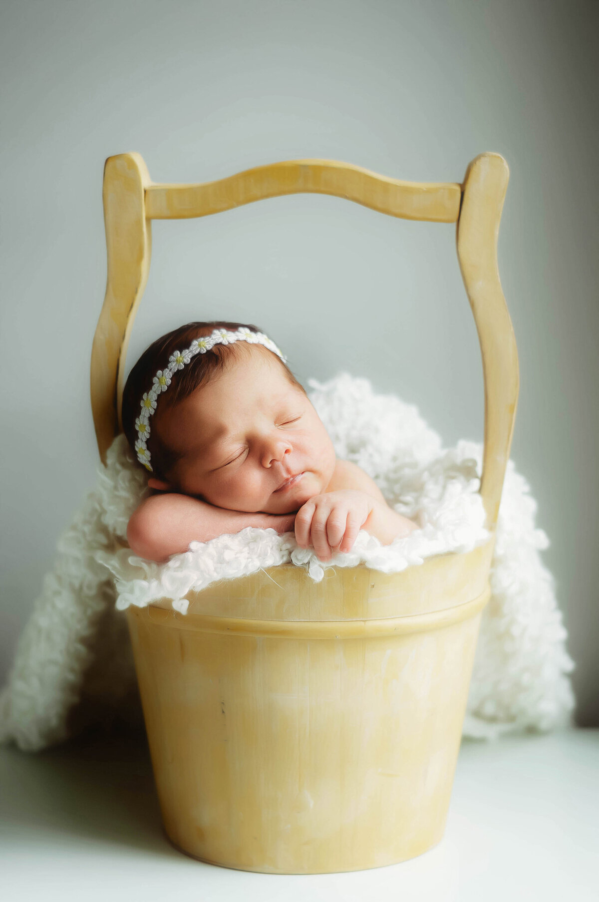 Infant posed for Newborn Photos in Charleston, SC.