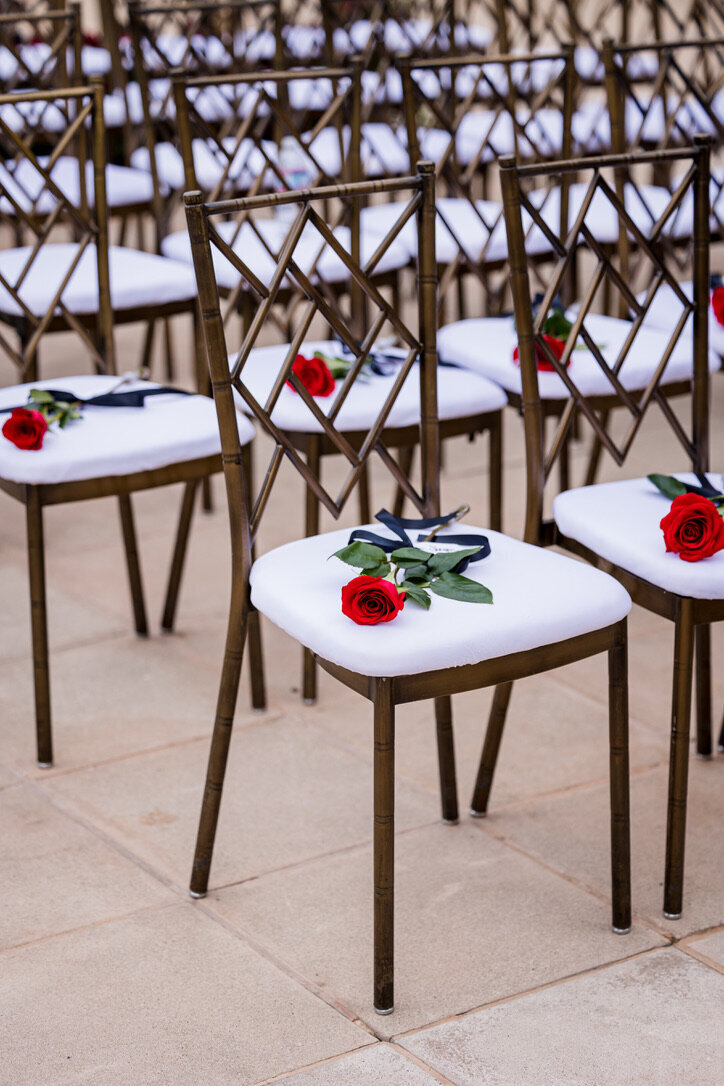 red roses, black ribbon, ceremony, gold chairs, wedding, fall wedding 
