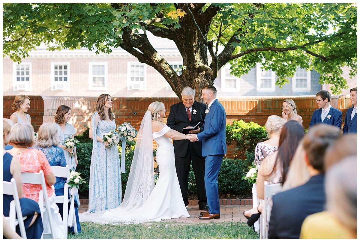 Explore our stunning portfolio showcasing a beautiful Chapel Hill wedding at The Carolina Inn, featuring a captivating blue, white, and greenery color palette. Immerse yourself in the elegance and charm of this picturesque venue while drawing inspiration for your own special day. Let our curated collection of images transport you to a world of timeless romance and exquisite design. Start envisioning your dream wedding today!