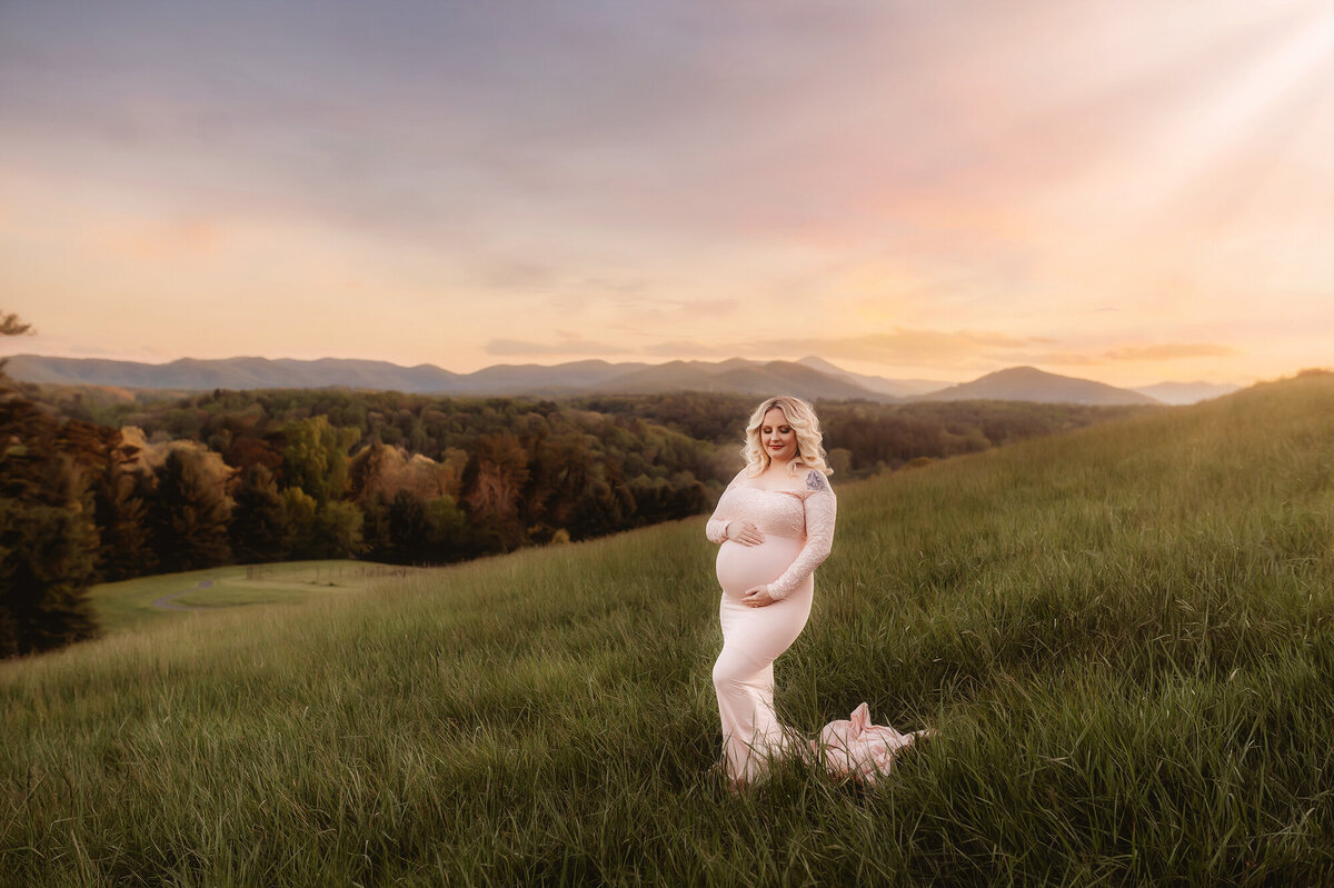 Pregnant woman poses for Maternity Photos at Biltmore in Asheville, NC.