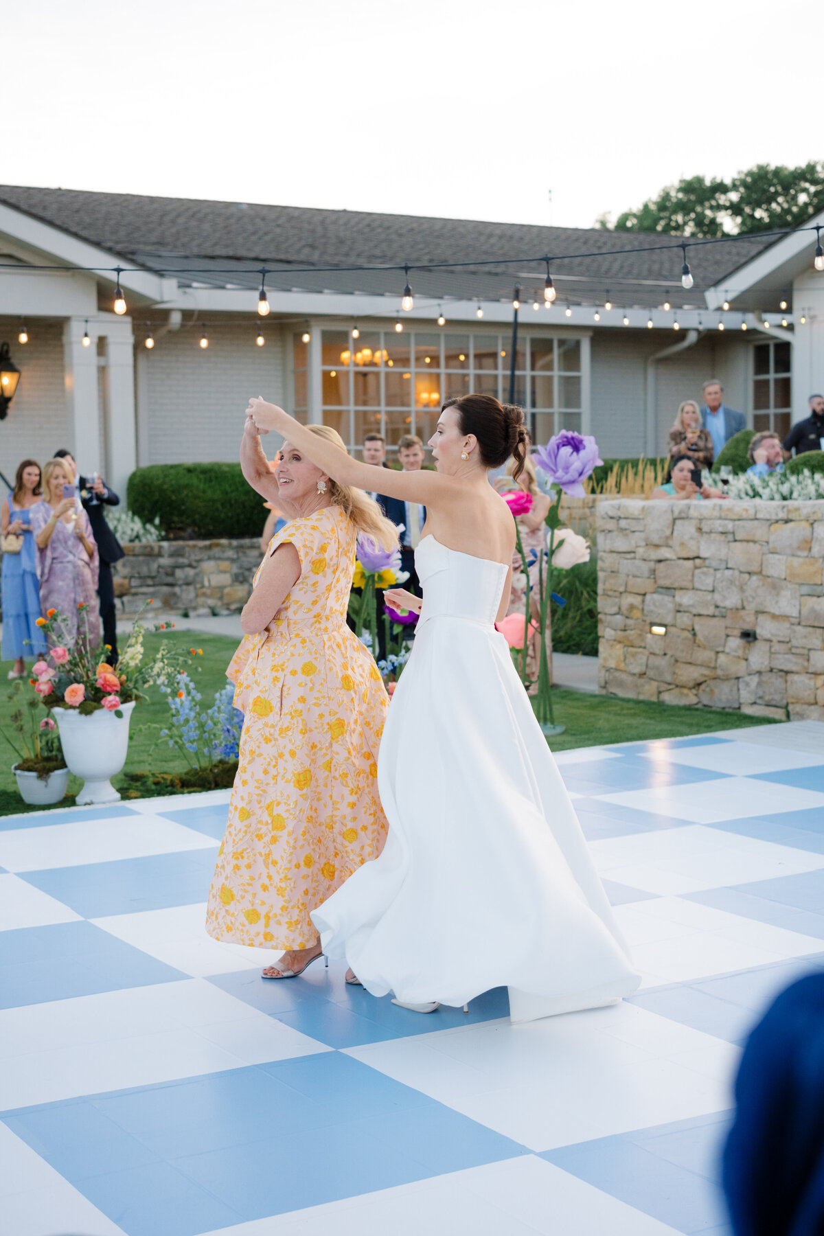 bride and mom dancing at Mission Hills Country Club Kansas City wedding