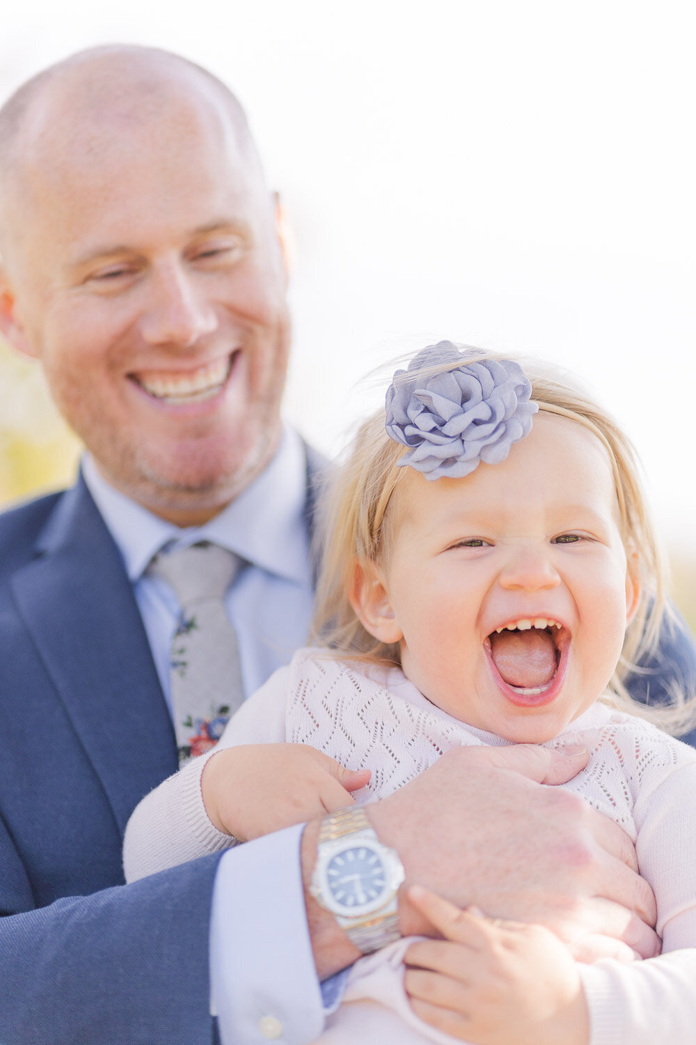dad and daughter laughing during fall mini session taken by a Vienna, Virginia photographer