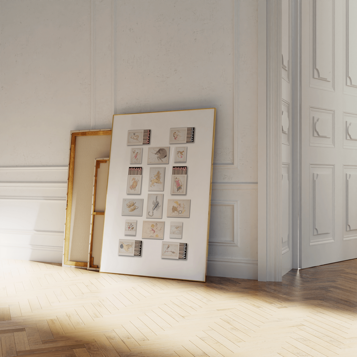 Two framed artworks lean against a white wall; one displays small sketches by Sweet Pea Ink Designs and the other is turned backward, revealing its plain back. Sunlight streams in through a nearby doorway, highlighting this touch of brand design inspiration.