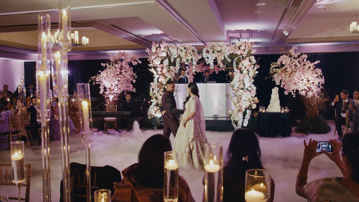 Indian wedding couple dancing at their wedding