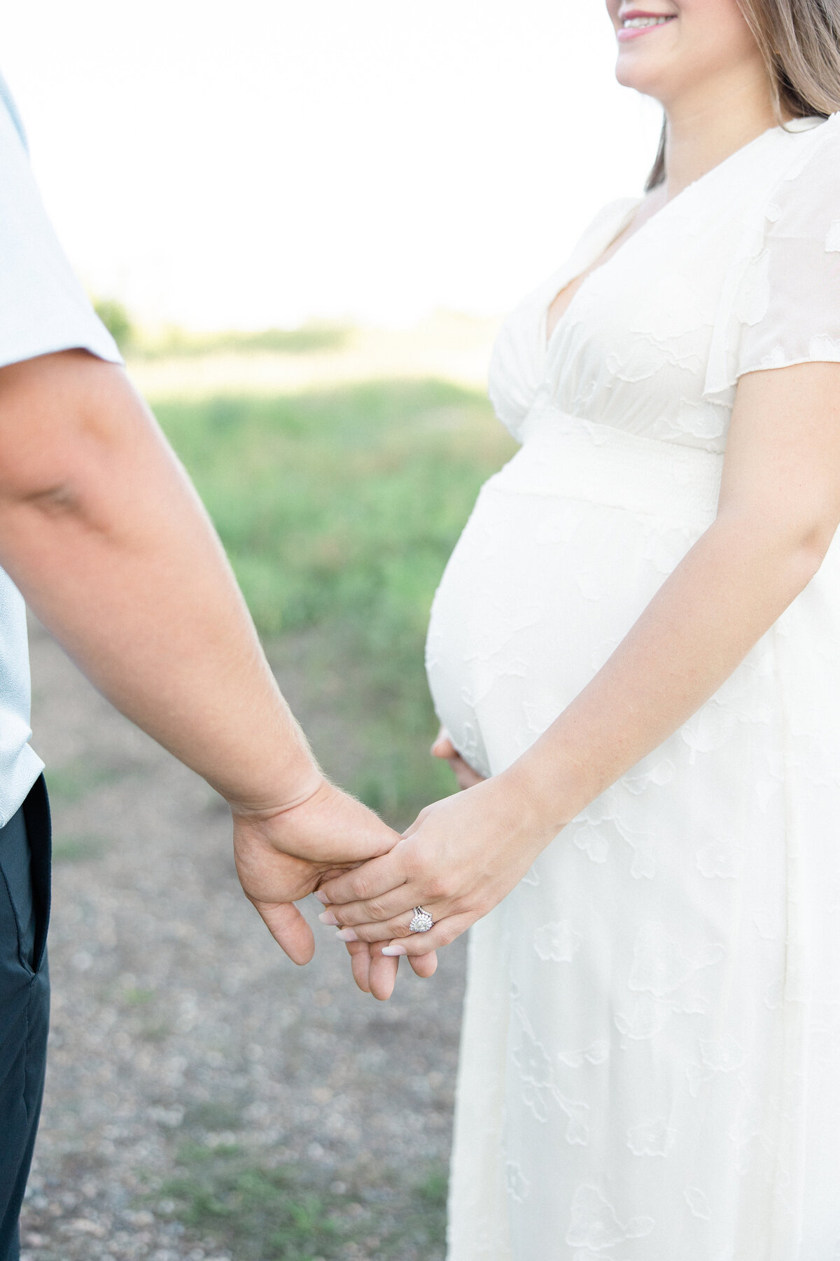 Couple holding hands.