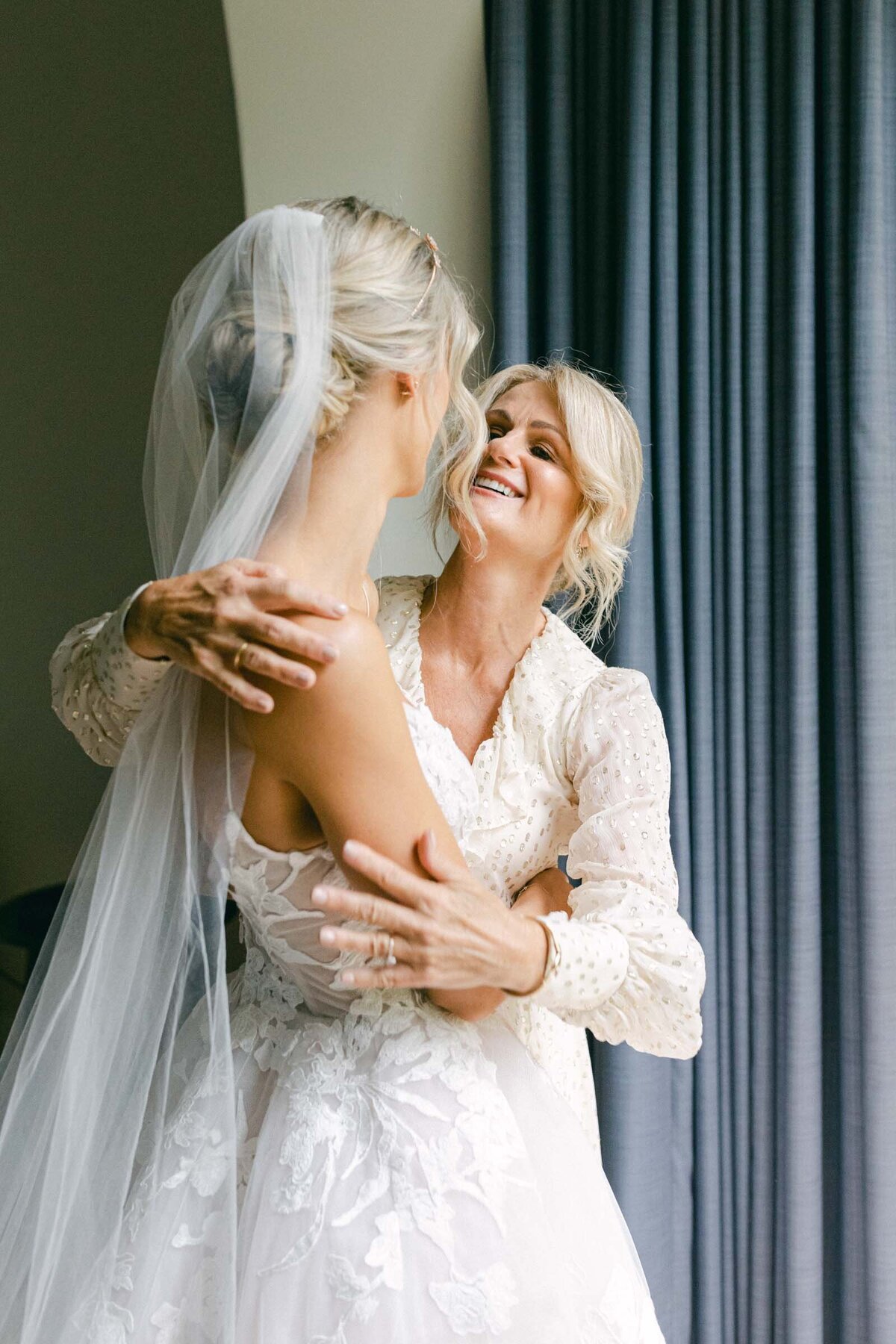 A tender moment between a bride and her mother