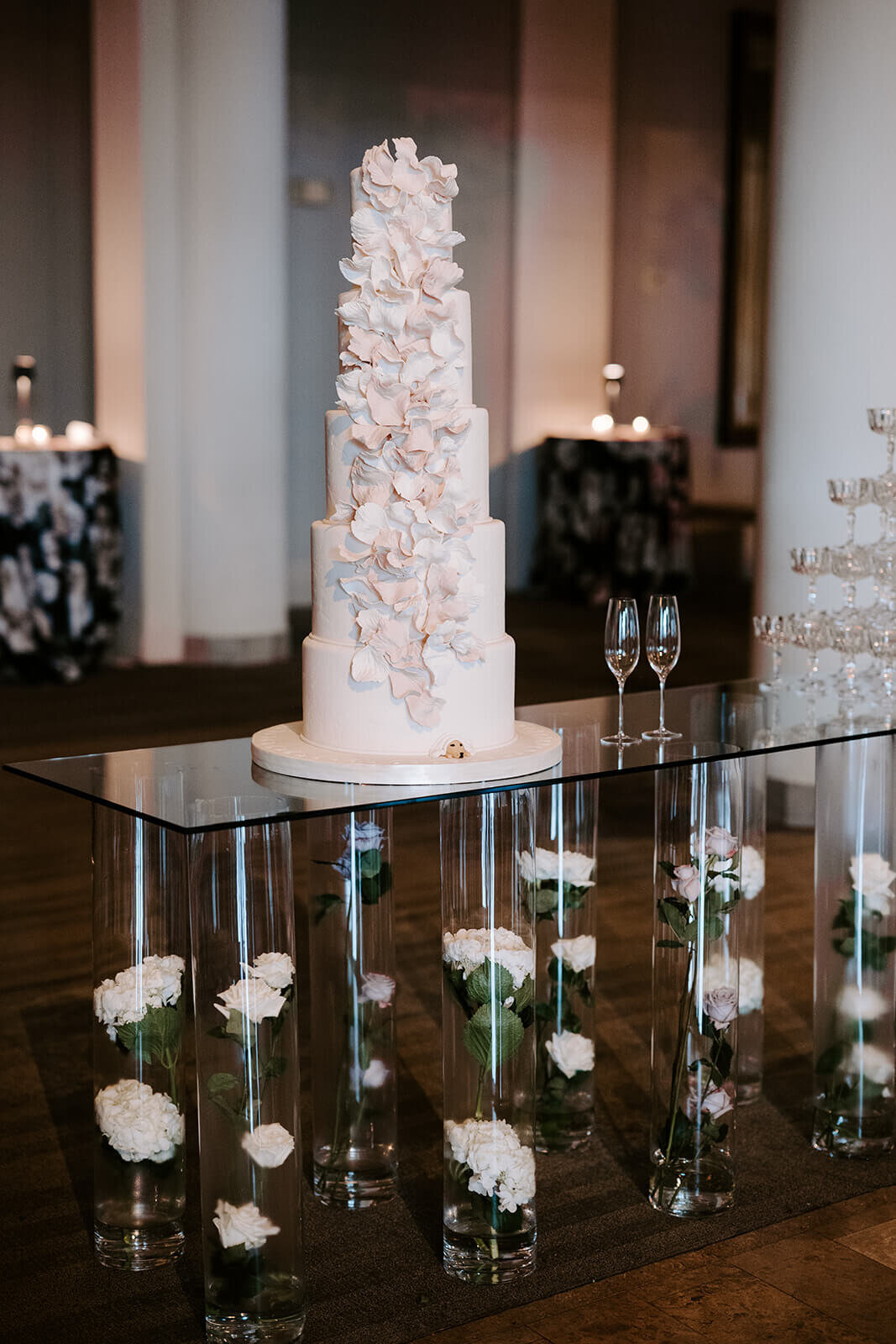 Five tier wedding cake covered in sugar  flowers