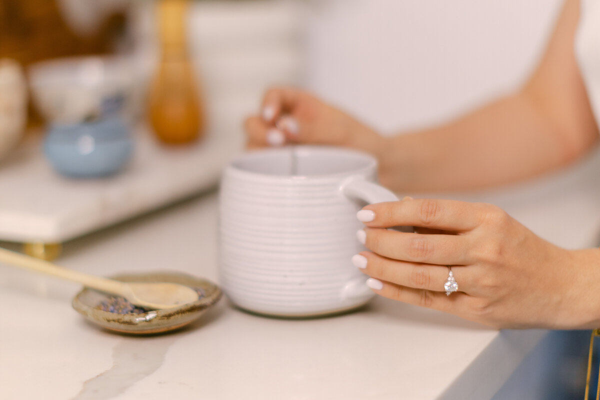 A warm cup of tea on a soft surface, evoking comfort and calm—symbolizing the safe, trauma-informed therapy experience offered by Merlyn Asencio in Miami.