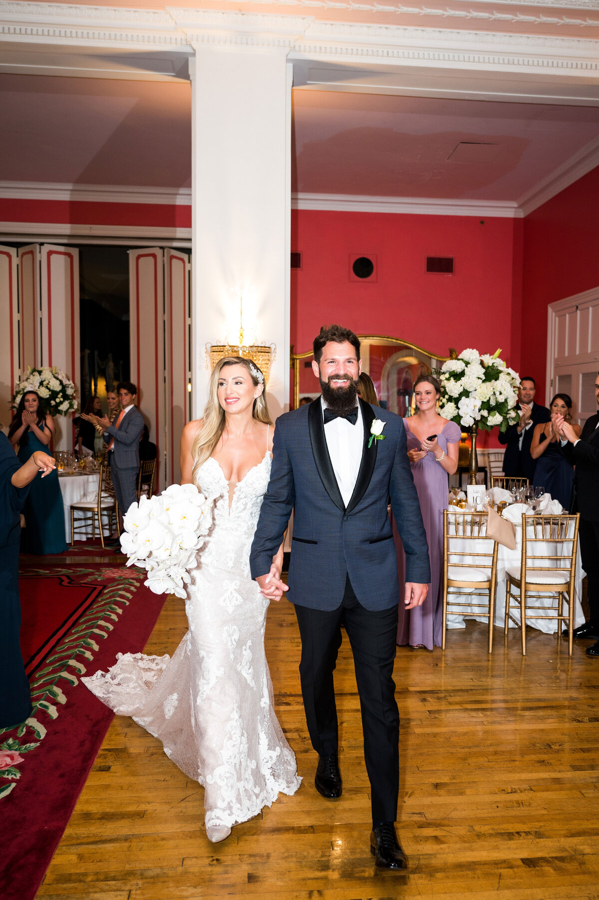 bride and groom being introduced into their wedding reception at the greenbrier resort cameo ballroom