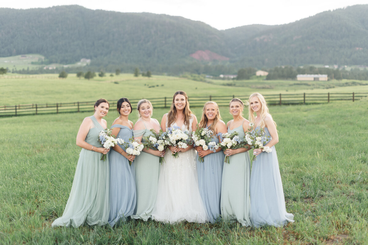 Summer dusty blue & sage wedding at Spruce Mountain Ranch, Larkspur, Colorado. Bridesmaids photos.