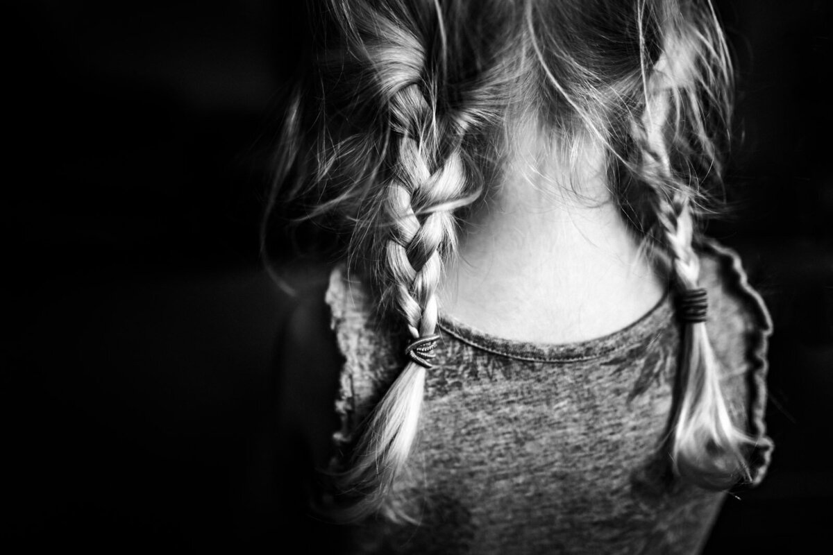 close up of little girl's messy braids