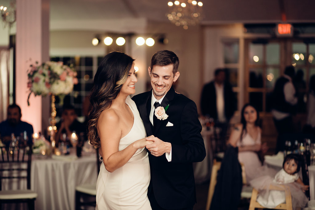 Wedding Photograph Of Groom Dancing With a Woman In White Dress Los Angeles