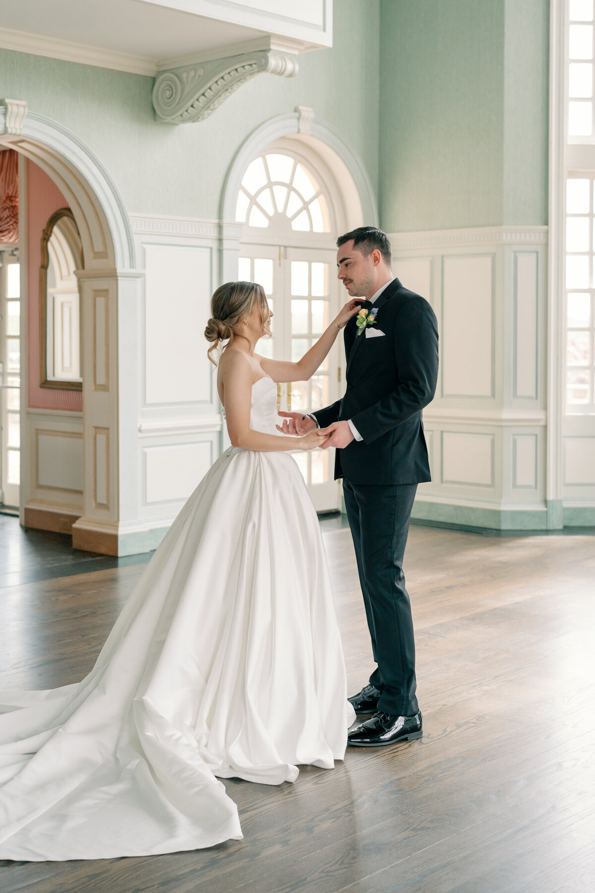 Wedding at the Estate at River Run in Maidens, VA | Wedding Photographer in Richmond | bride and groom going in to hug each other in the Estate at River Run ballroom