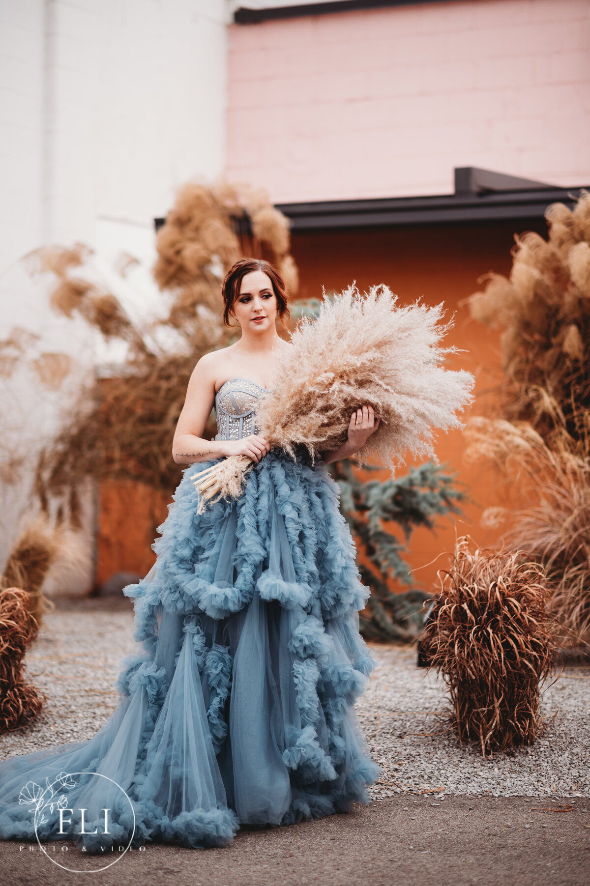 cincinnati wedding photographer videographer mojave east venue pampas grass florals blue tulle dress 