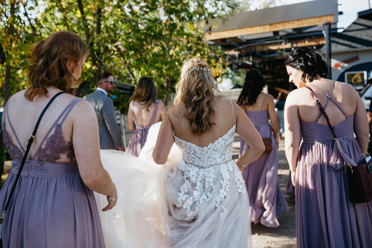 bridal-party-walking-into-a-bar