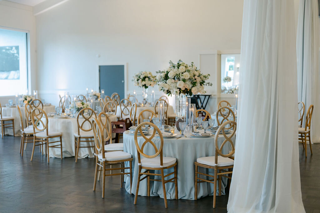 ballroom, light blue, tall arrangement, low centerpiece 