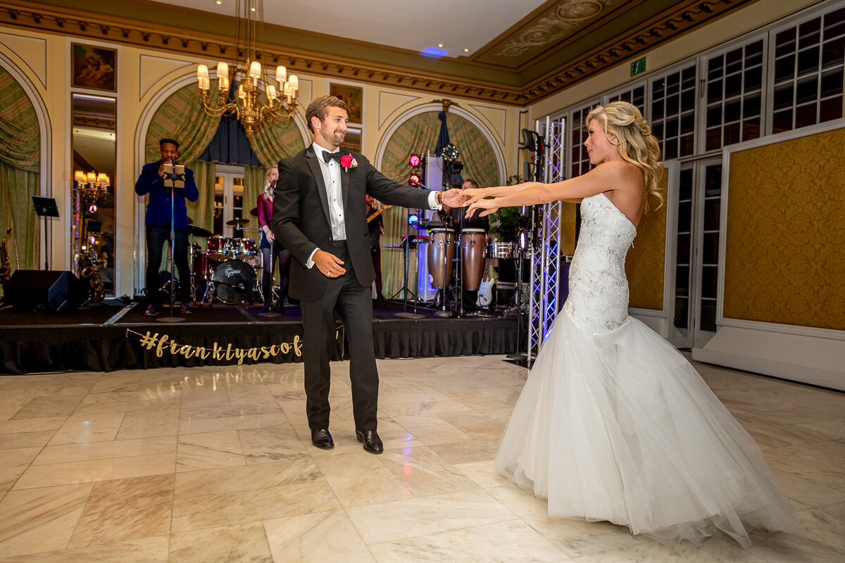 A bride and groom have their first dance at the Broadmoor