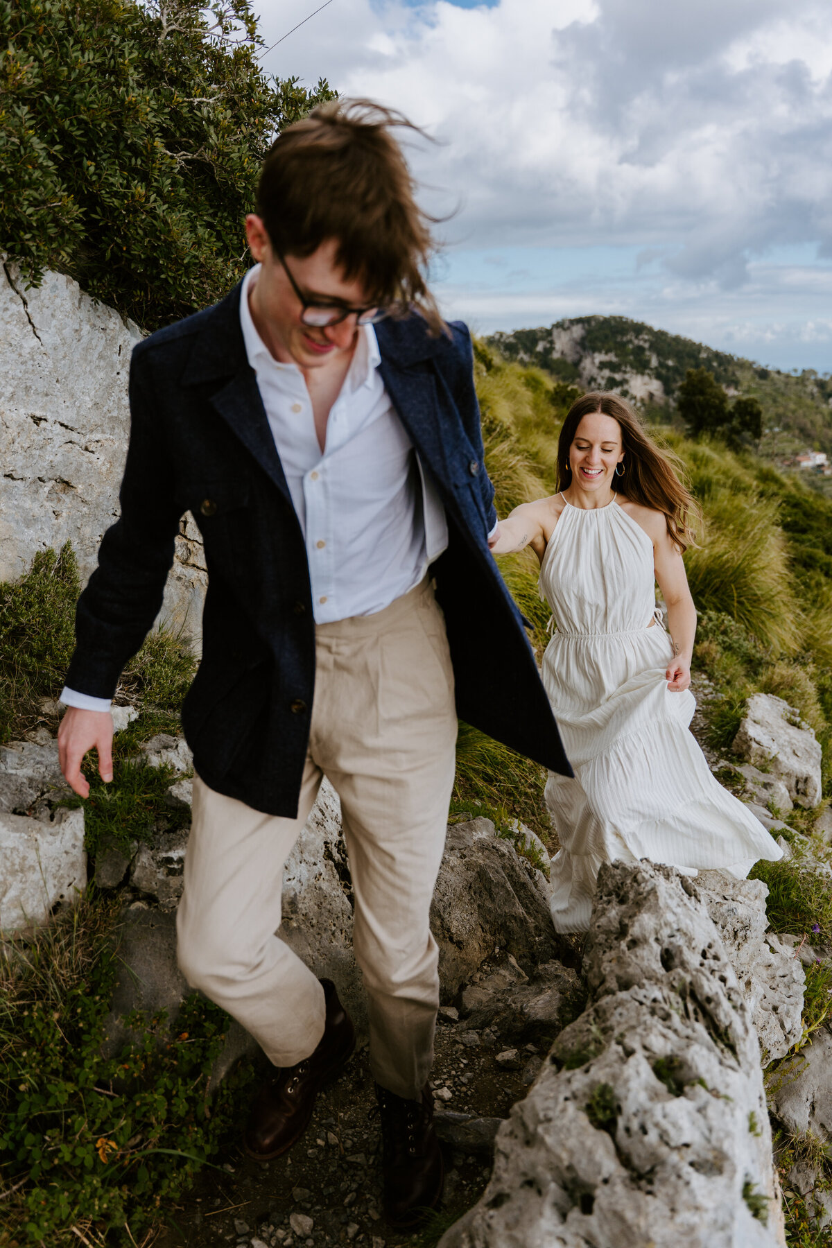 Couple running on a trail together.