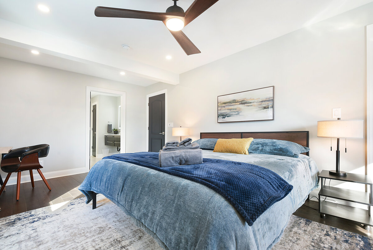 Bright and inviting staged bedroom showcasing functional design for quick home sale