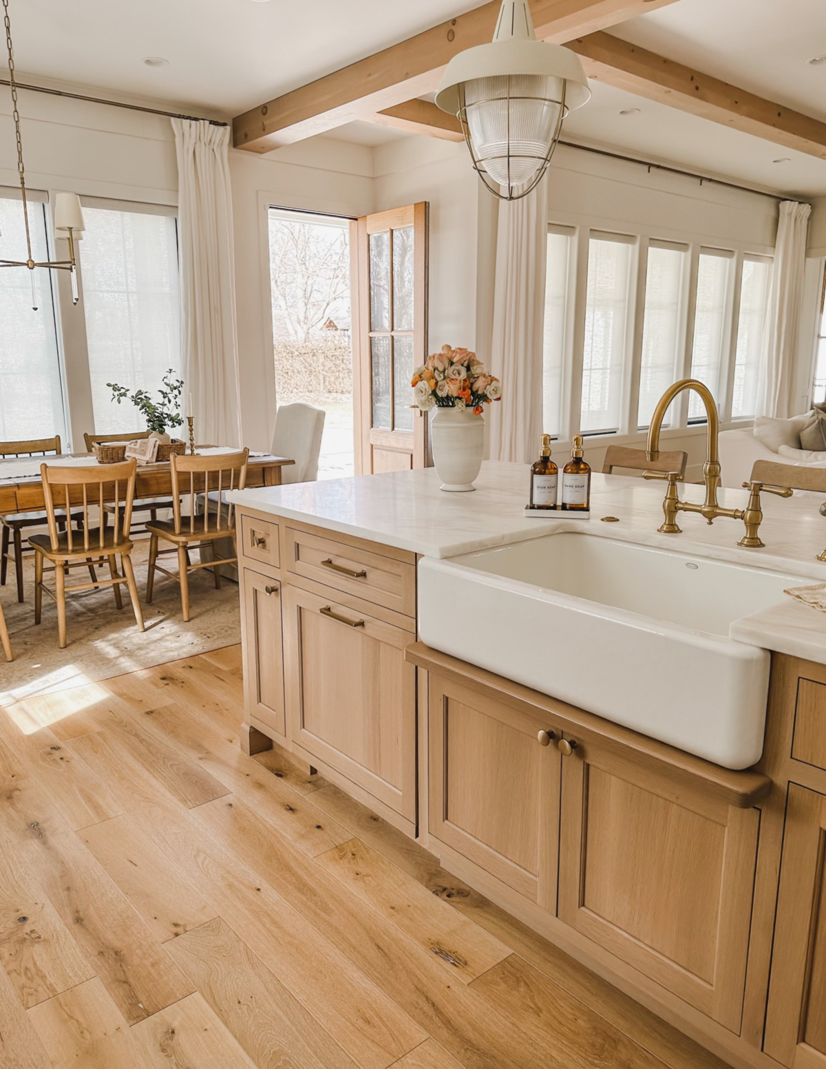 The kitchen cabinets were handmade by a local Amish builder and are stained in a beautiful natural finish