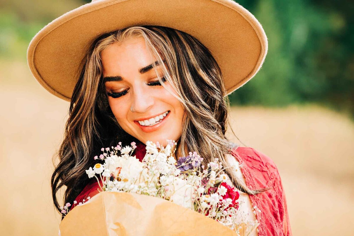 Senior photo of Missoula girl holding dried flowers