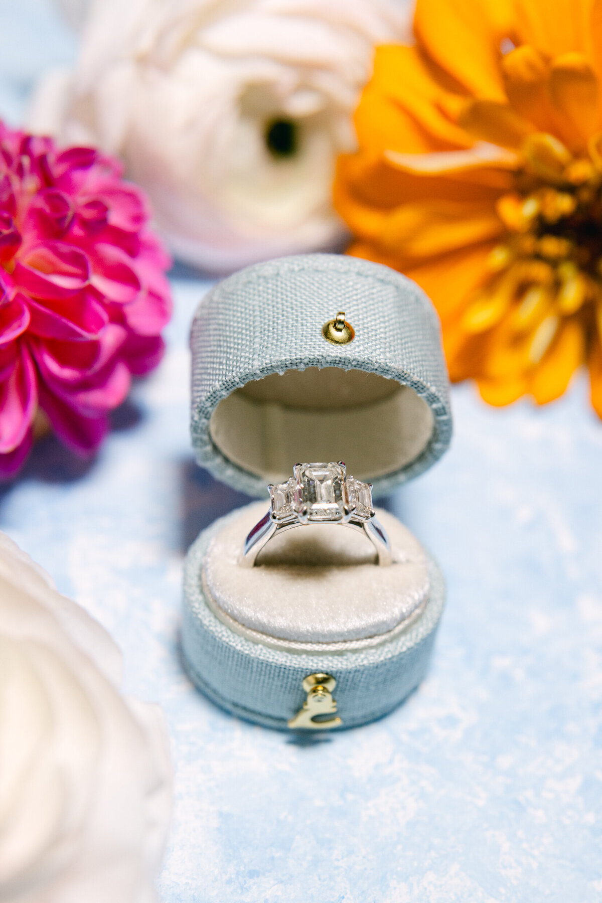 A wedding photo of the brides ring in it's ring box