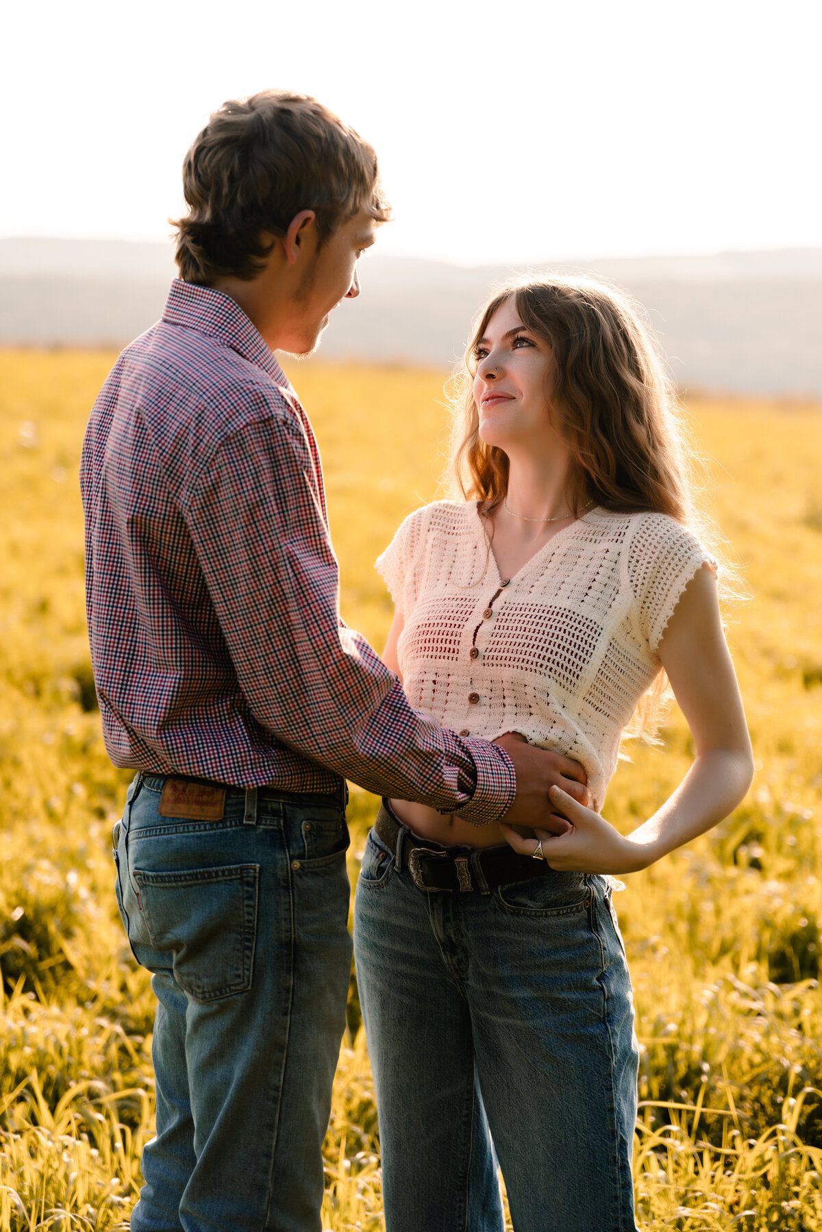 syracuse couple in a field