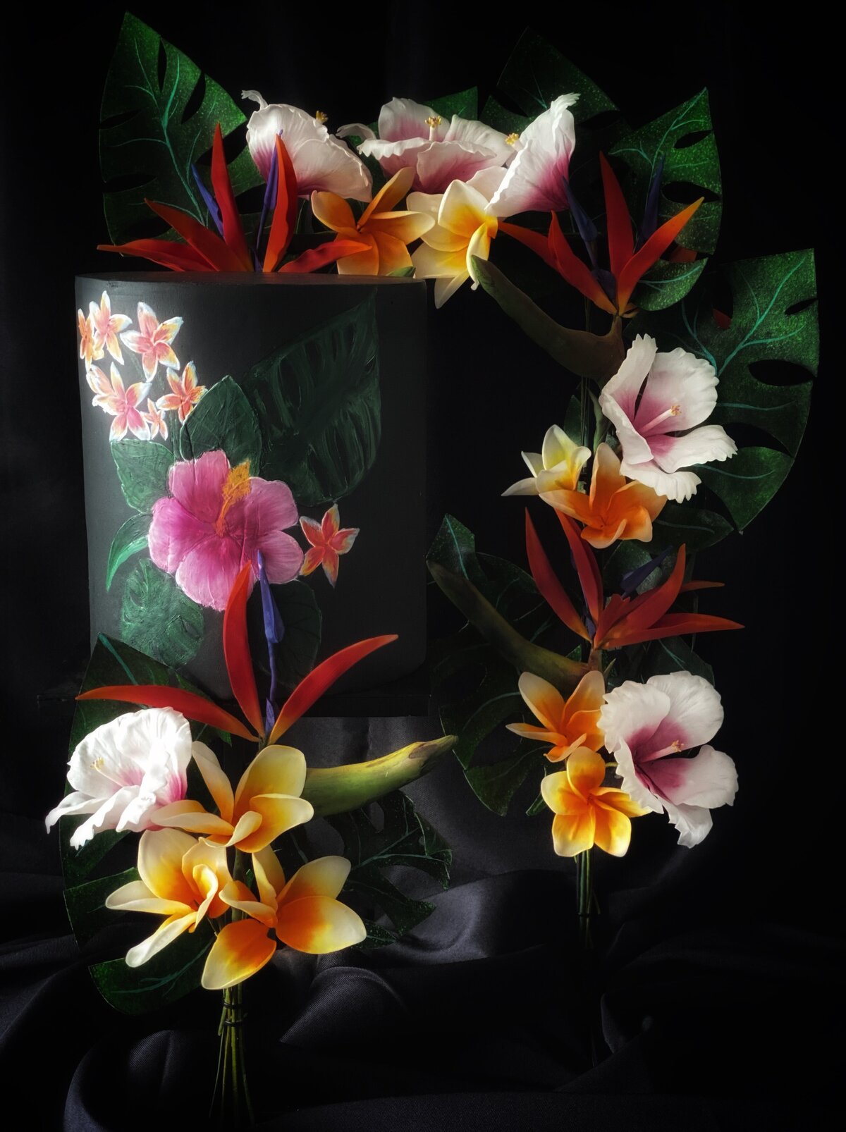 Hand painted black tropical cake with sugar tropical flowers