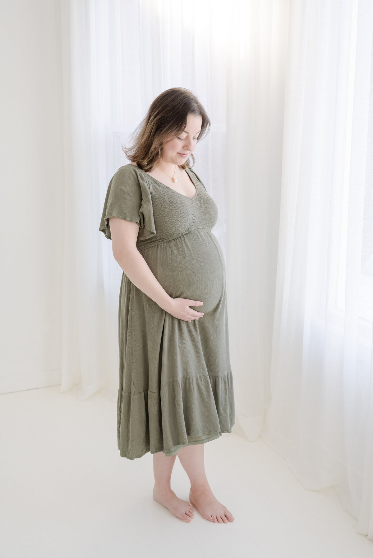 Maternity photos in bright studio space in Stamford, CT