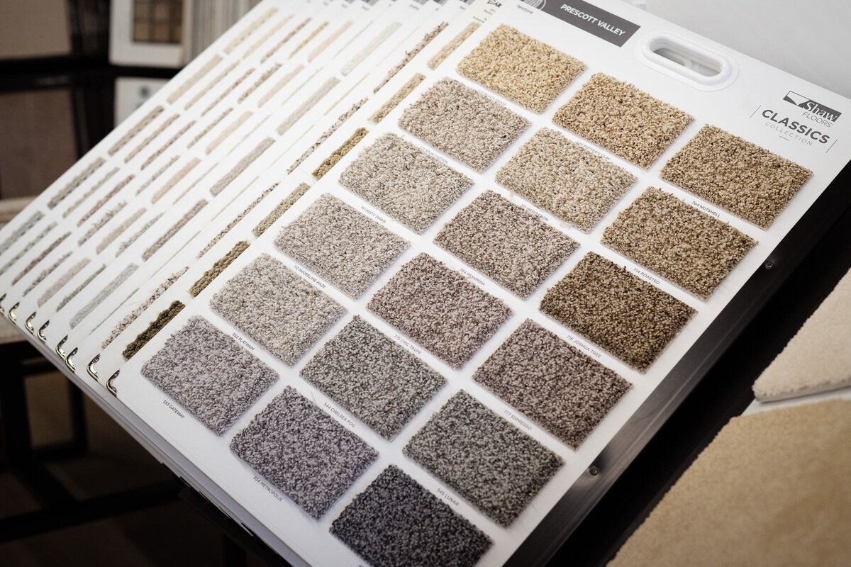 Several carpet samples in different colors.