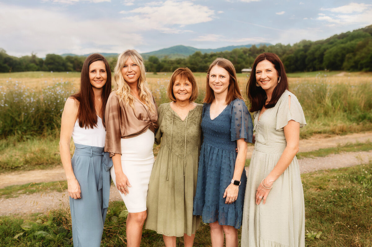 Family poses for Family Photos during an Extended Family Portrait Session in Asheville, NC.