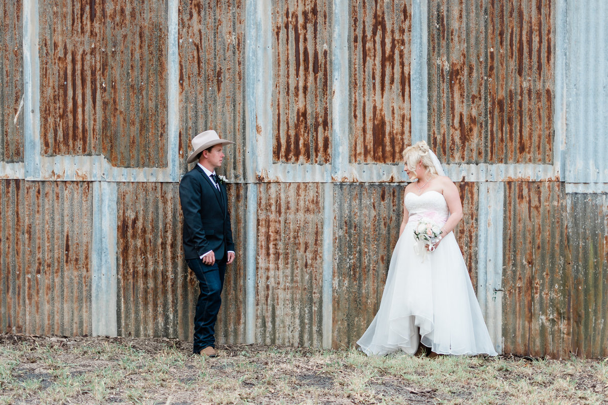 groom-bride-barn-cowboy-Minden-Retreat-wedding