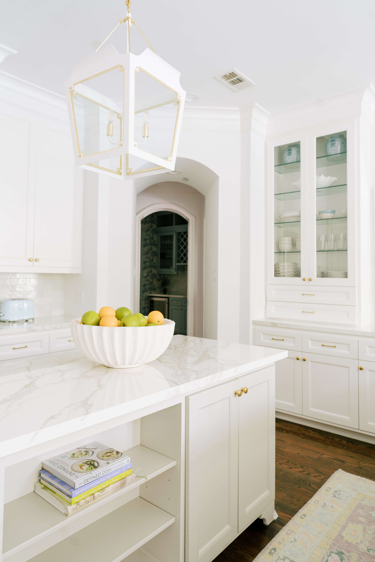 oyster creek studios hause white kitchen with marble counters