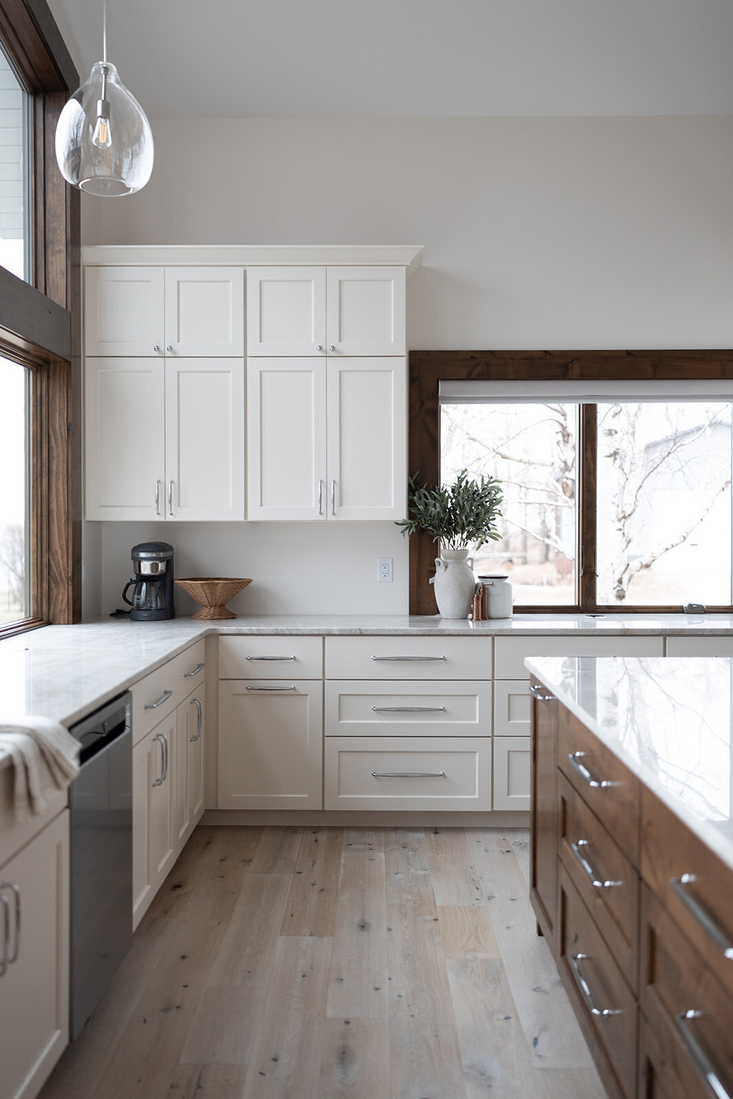 michele rosenboom design clean country renovation kitchen with wood floors and white cabinets