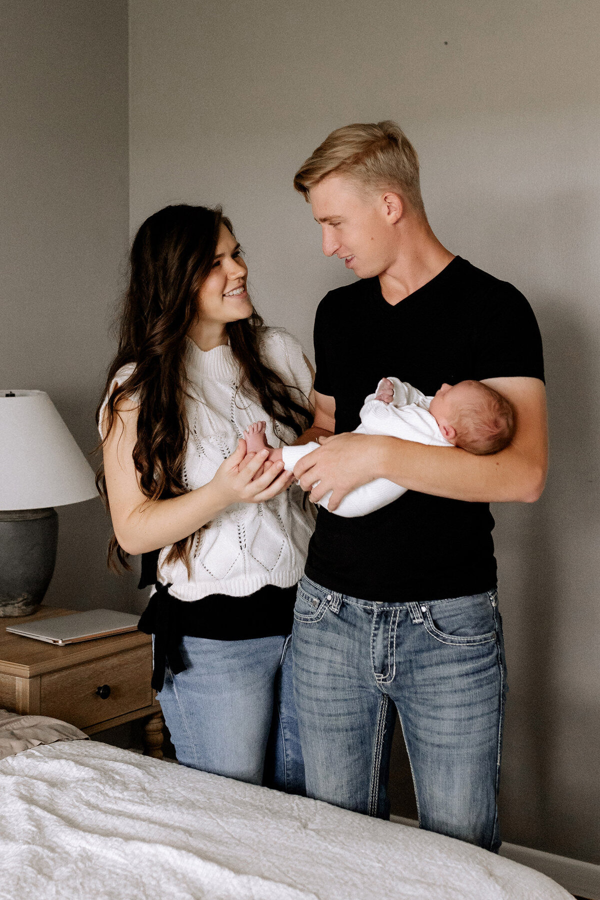 lifestyle newborn baby boy session dad holding baby