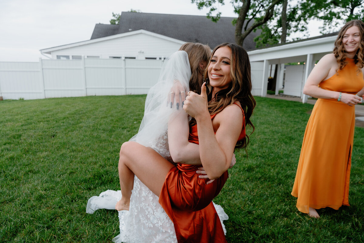 hugging-bride-outdoors