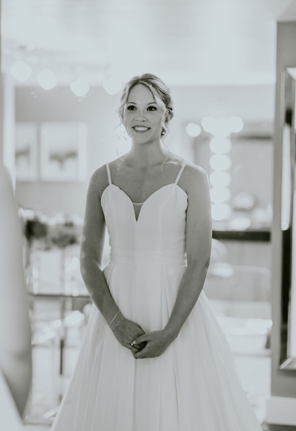 black and white image of a bride in her wedding gown at the Willowbrook wedding venue preparation suite