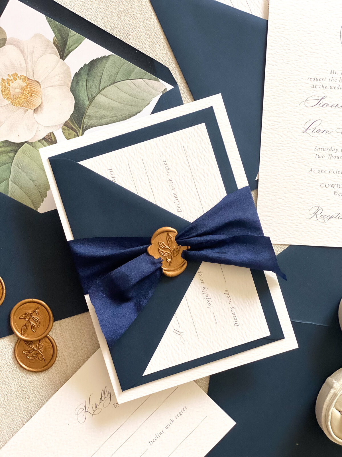 Wax seal and ribbon on invitations