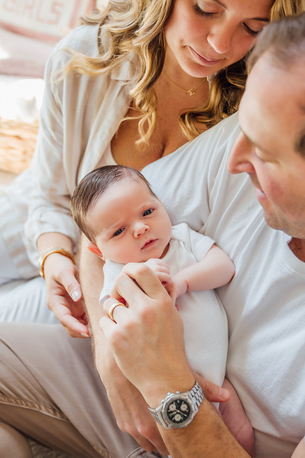 baby in dads arms long island photographer