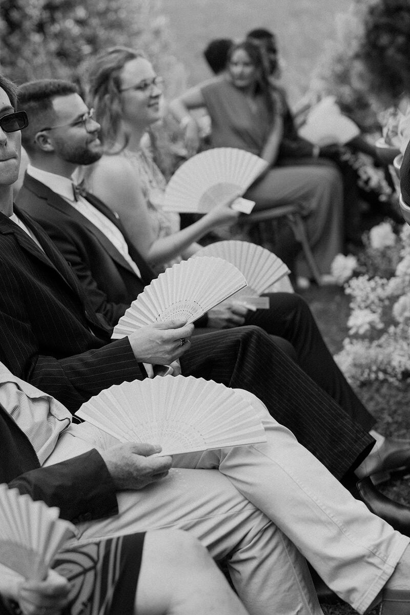 wedding-guests-during-ceremony-blackwhite-laurianevega