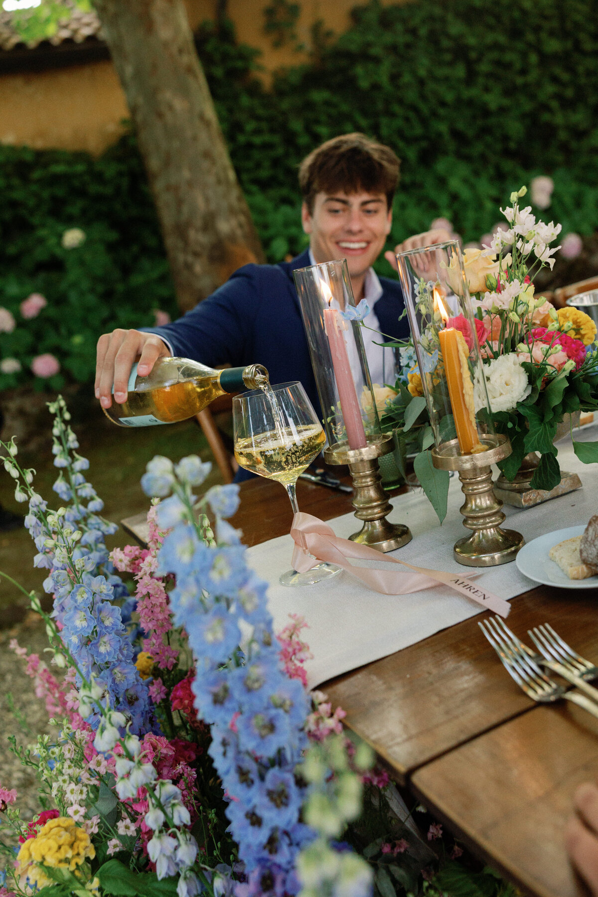 Red wine toast shared by family and friends during reception