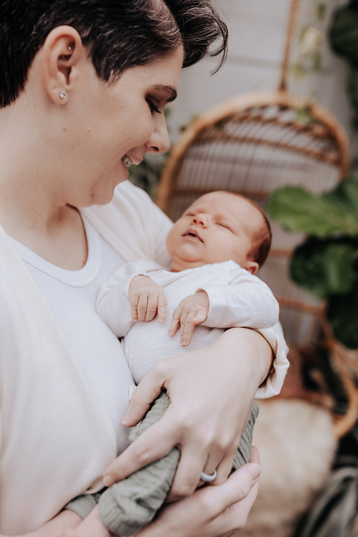 Nashville newborn photographer captures mother holding baby