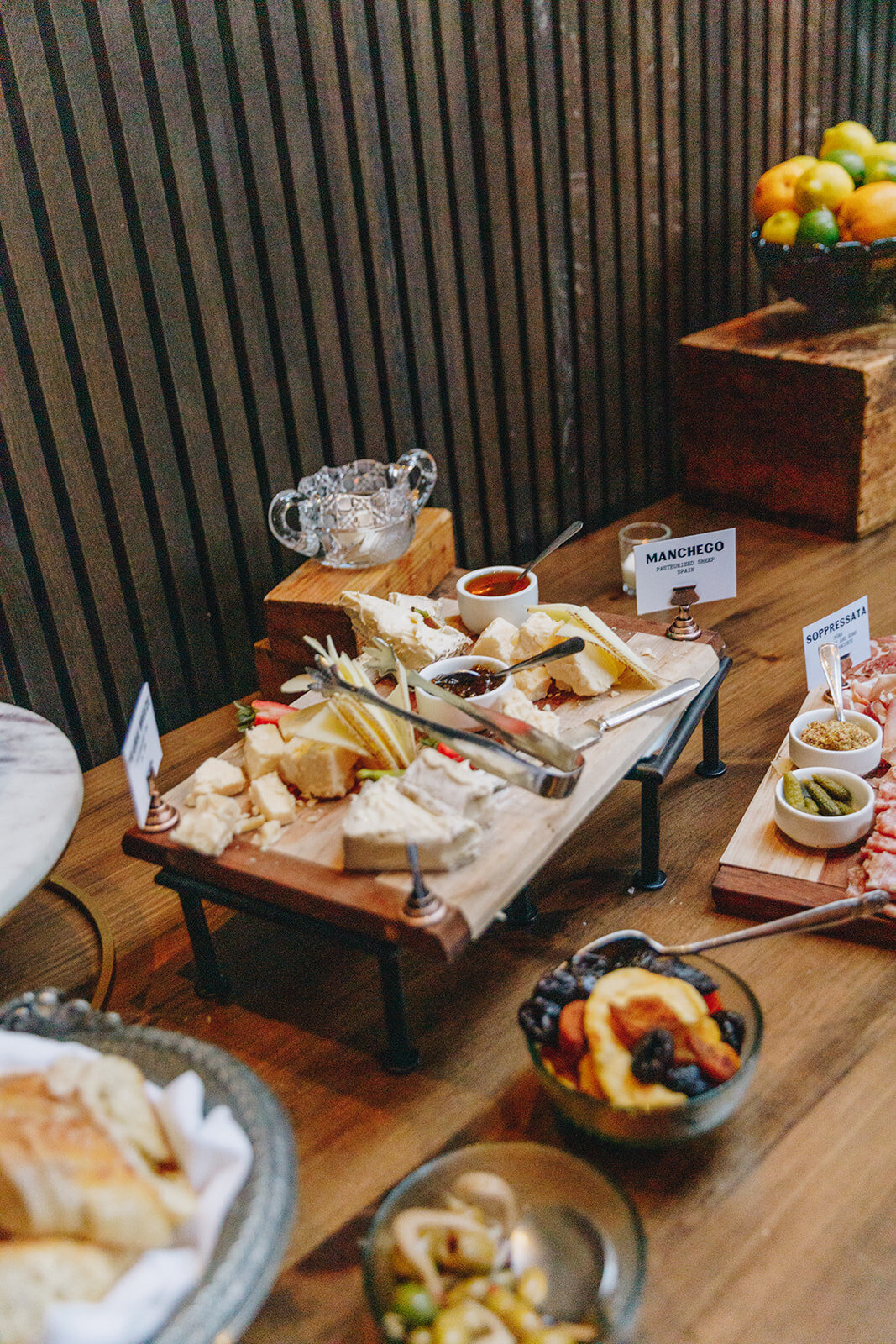 charcuterie board at cocktail hour for a wedding reception, jams and cheeses