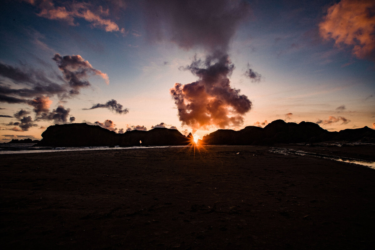 sunset over oregon coast wedding photography