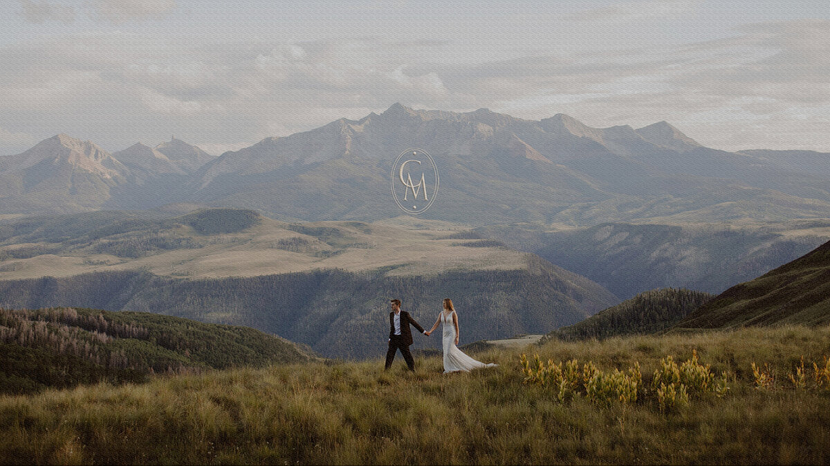 Couple walks together in Telluride mountains