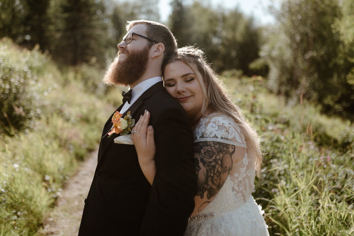 Bride and groom embracing