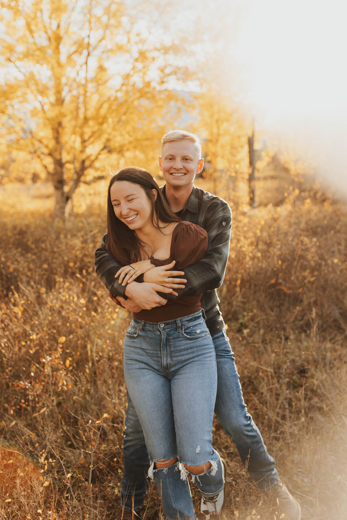 couple embracing laughing