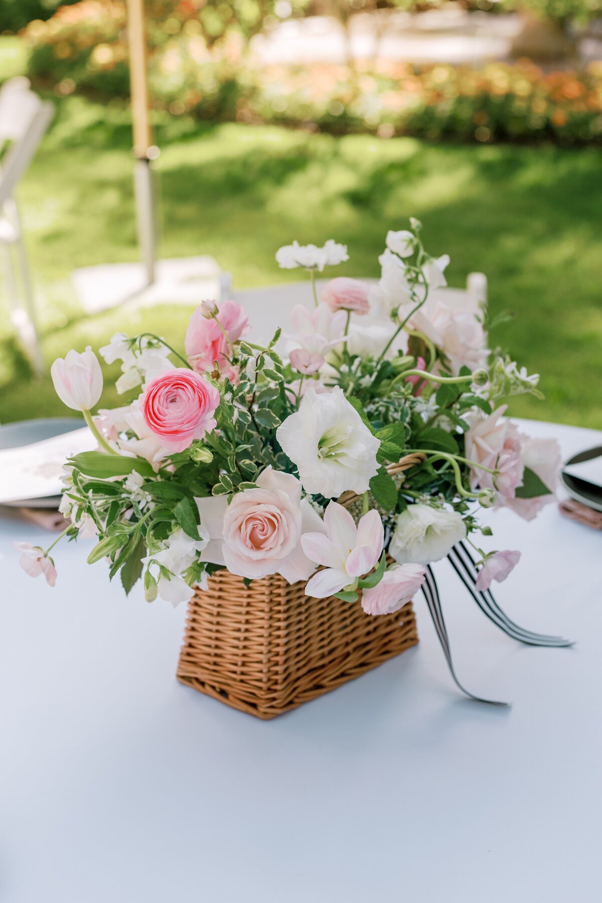 bows, flowers, wicker basket centerpiece