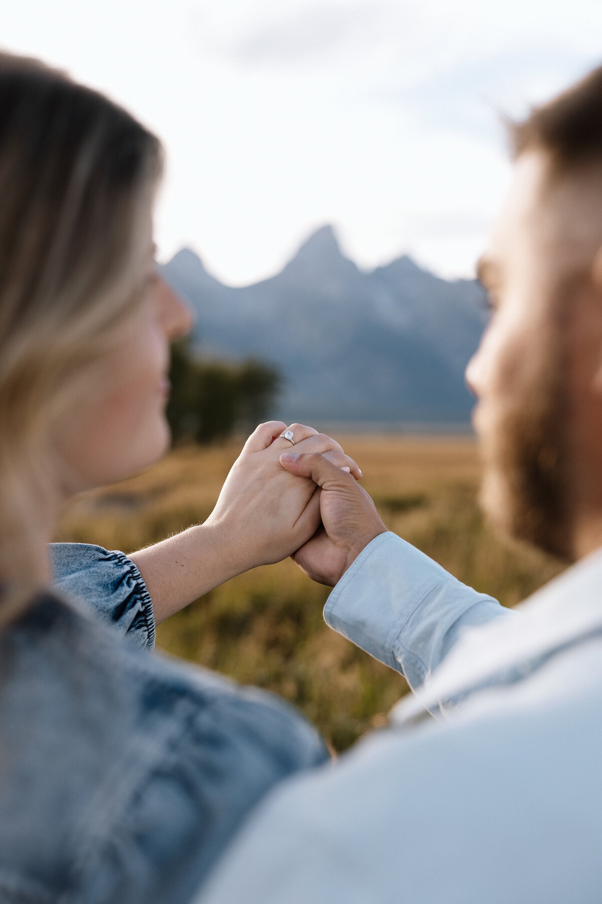 Grand Tetons Couple engagement photo at Mormon Row